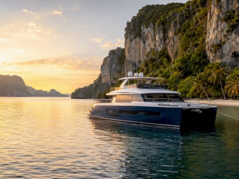 Luxury power catamaran anchored at island bay