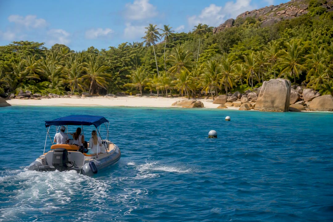 Yacht tender near secluded Caribbean beach