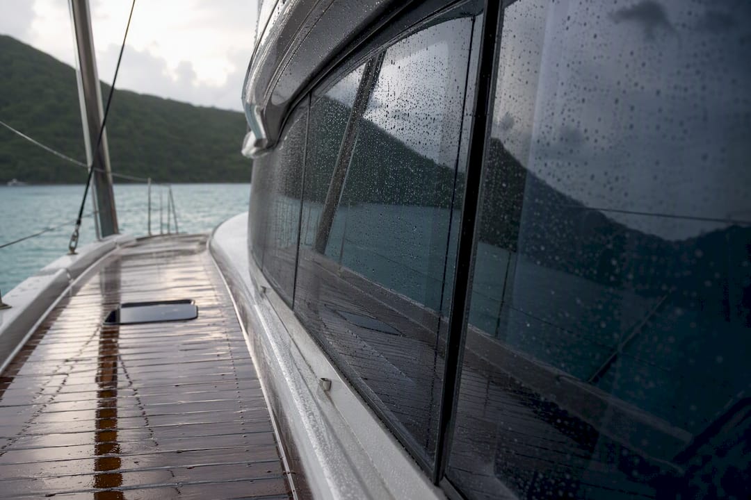Rain droplets on wet yacht window