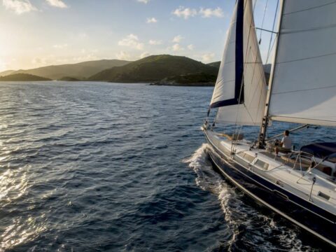 Luxury sailboat sailing BVI waters in trade winds