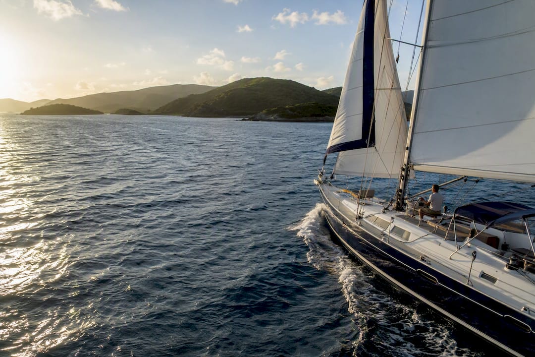 Luxury sailboat sailing BVI waters in trade winds