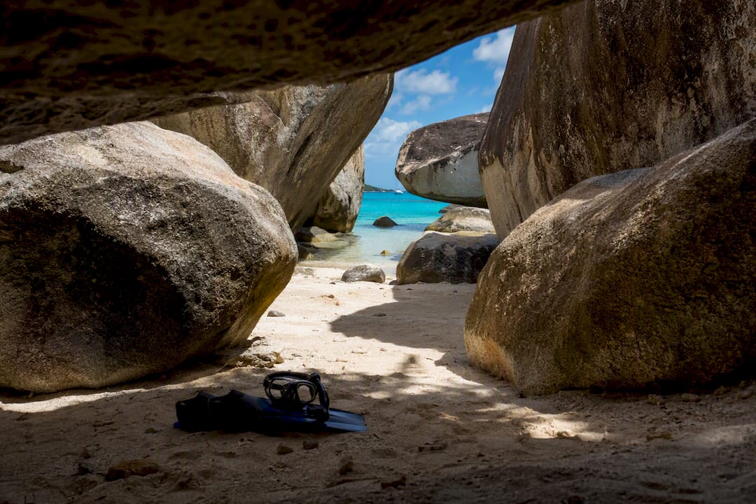 Large granite boulders and clear water at The Baths