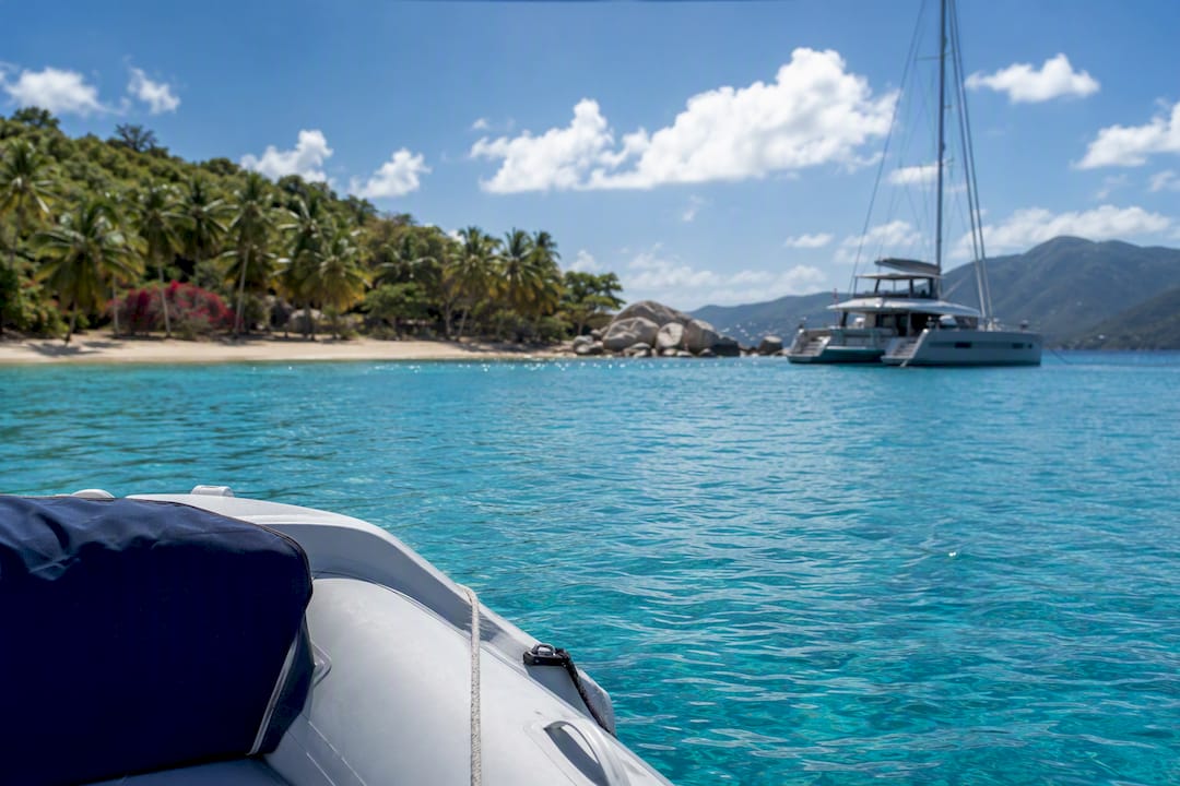 Luxury catamaran anchored near BVI coastline