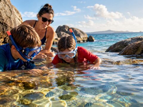 Children snorkeling in sheltered BVI granite pools