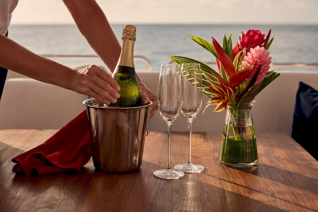 Champagne and flowers prepared aboard a yacht