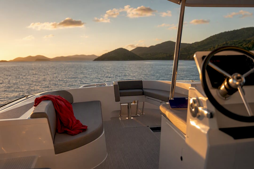 Power catamaran cockpit overlooking BVI islands