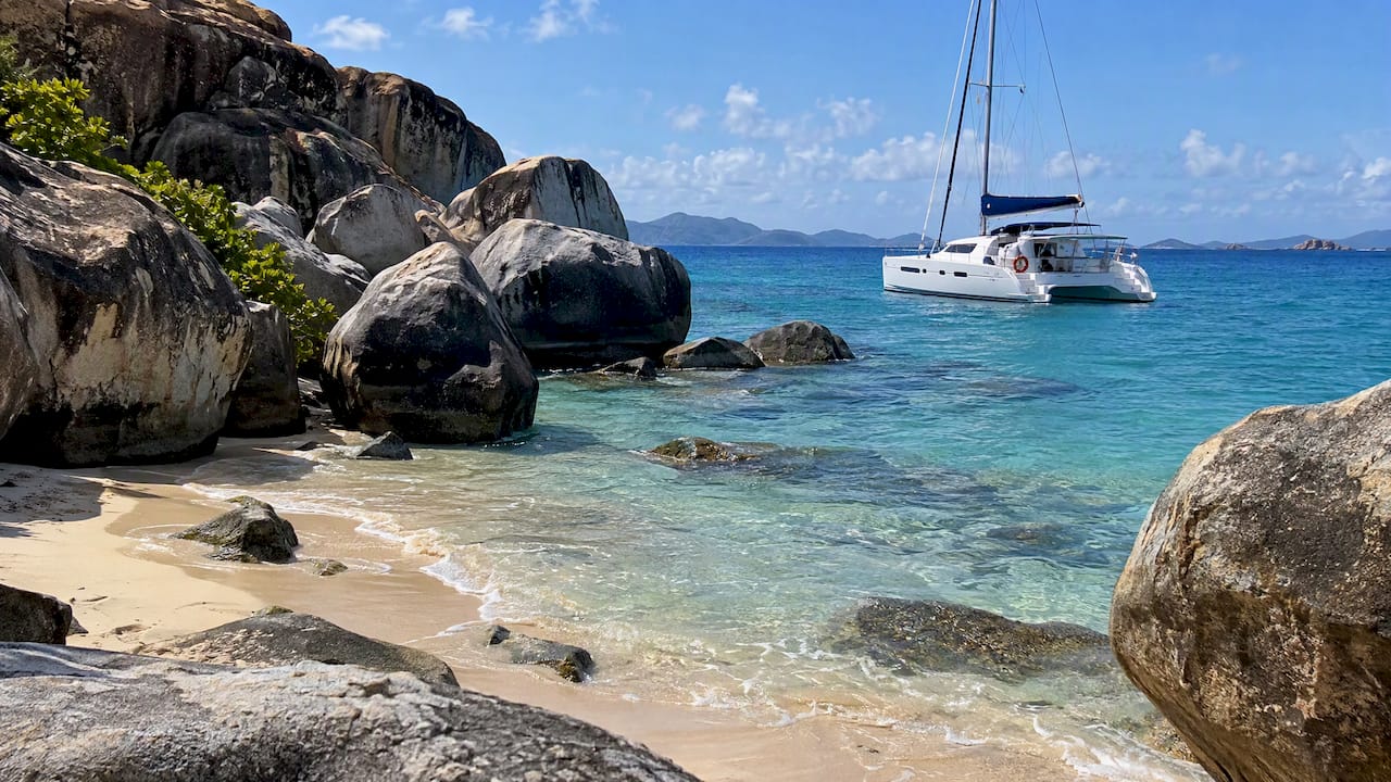 Charter yacht offshore from The Baths boulders